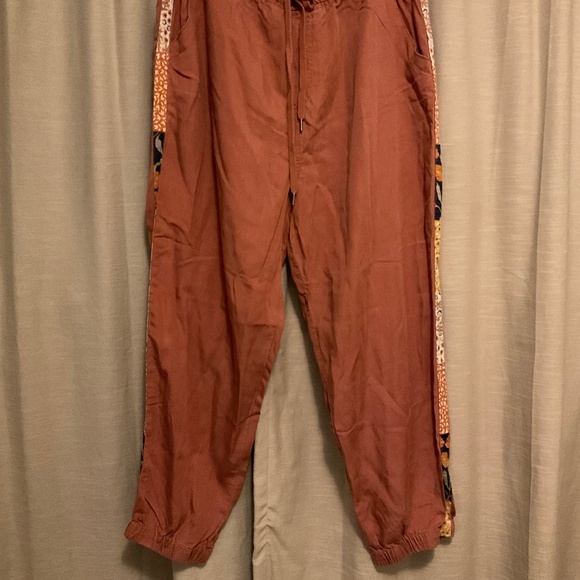 Super soft deep mauve jogger style pants with bohemian fabric side strips - Picture 1 of 8